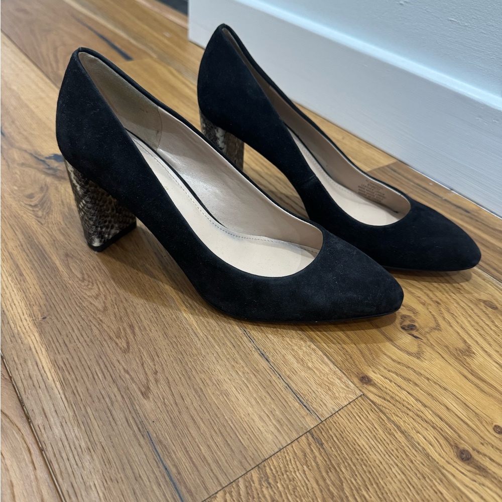 Women’s Essex lane black heels with snakeskin accent